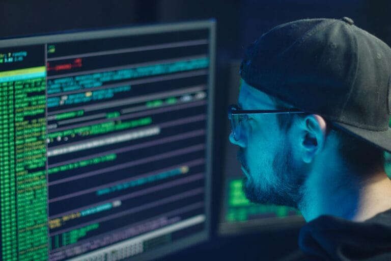 Cyber Crime in India: Rising Threats and Prevention Strategies Man in Blue Crew Neck Shirt Wearing Black Framed Eyeglasses